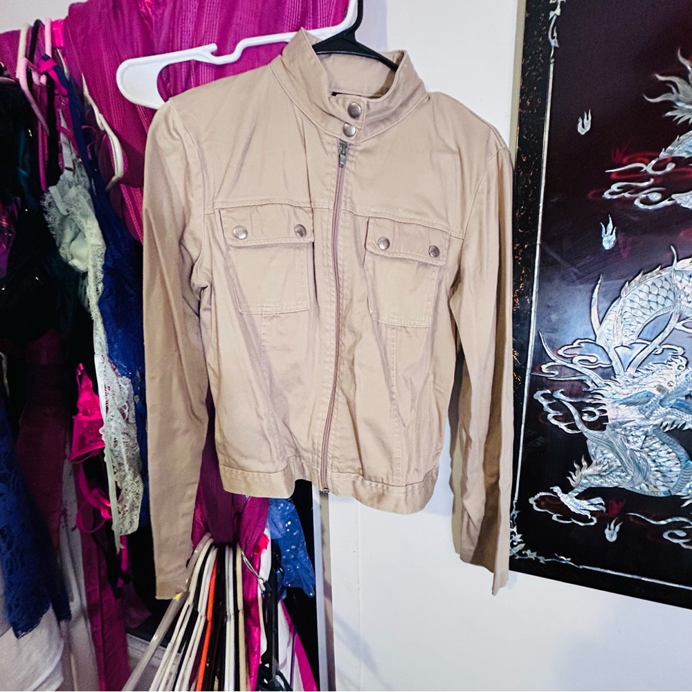 Maurice’s tan jacket
